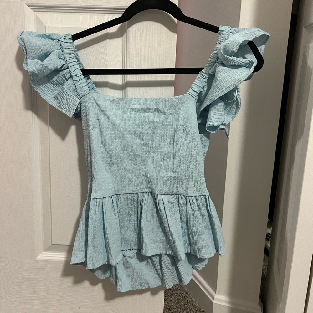 Blue ruffled tank top